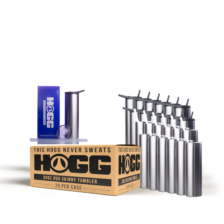 A case of 25 stainless steel skinny tumblers with a screw on lid, clear straw, and a carabiner clip. The product is displayed alongside its packaging which has the brand name 'HOGG'.